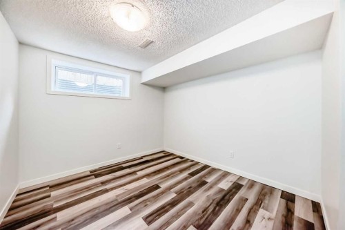 80 Eversyde Way Sw, Calgary, AB - Indoor Photo Showing Other Room