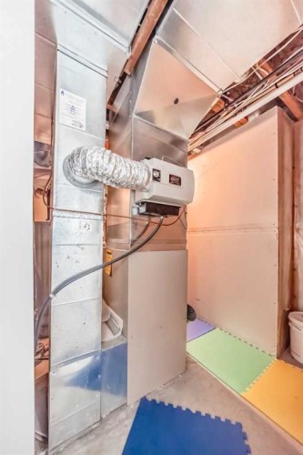80 Eversyde Way Sw, Calgary, AB - Indoor Photo Showing Basement