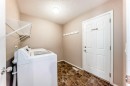 80 Eversyde Way Sw, Calgary, AB  - Indoor Photo Showing Laundry Room 