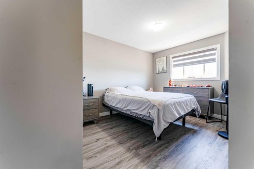 222 Bayside Point Sw, Airdrie, AB - Indoor Photo Showing Bedroom