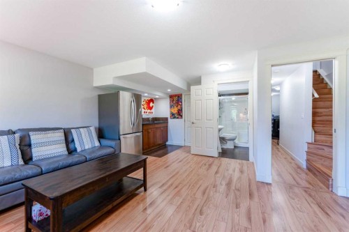 222 Bayside Point Sw, Airdrie, AB - Indoor Photo Showing Living Room
