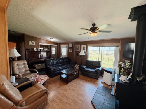 4142 Township Road 290, Rural Mountain View County, AB - Indoor Photo Showing Living Room