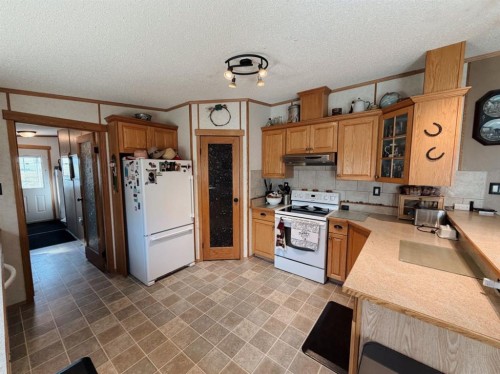 4142 Township Road 290, Rural Mountain View County, AB - Indoor Photo Showing Kitchen With Double Sink