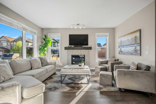 86 Legacy Green Se, Calgary, AB - Indoor Photo Showing Living Room With Fireplace