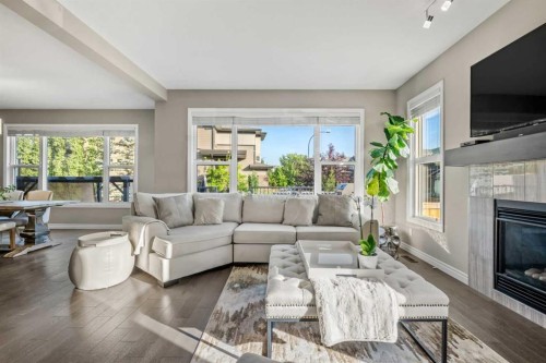 86 Legacy Green Se, Calgary, AB - Indoor Photo Showing Living Room With Fireplace