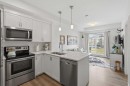 413-20 Seton Park Se, Calgary, AB  - Indoor Photo Showing Kitchen With Double Sink With Upgraded Kitchen 