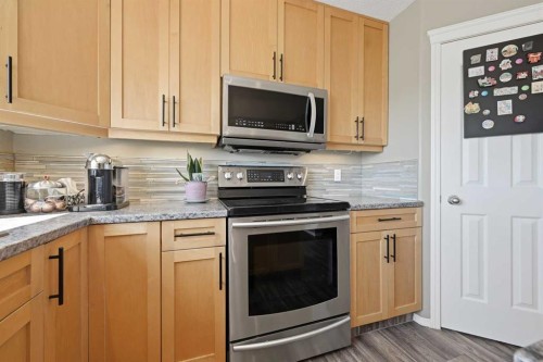119 Bridlewood Common Sw, Calgary, AB - Indoor Photo Showing Kitchen