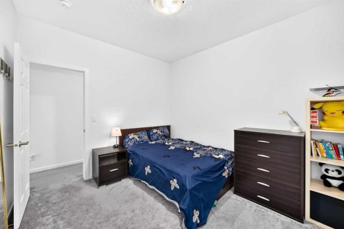 188 Carrington Crescent Nw, Calgary, AB - Indoor Photo Showing Bedroom