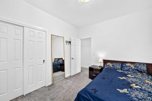 188 Carrington Crescent Nw, Calgary, AB - Indoor Photo Showing Bedroom