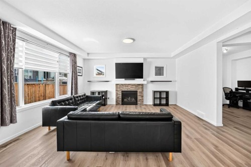 188 Carrington Crescent Nw, Calgary, AB - Indoor Photo Showing Living Room With Fireplace