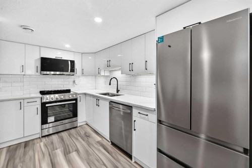 188 Carrington Crescent Nw, Calgary, AB - Indoor Photo Showing Kitchen With Double Sink With Upgraded Kitchen