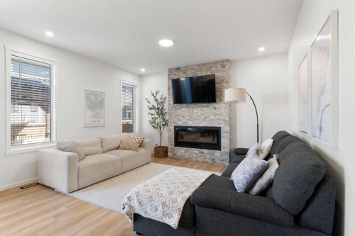 18 Southwinds Link Sw, Airdrie, AB - Indoor Photo Showing Living Room With Fireplace