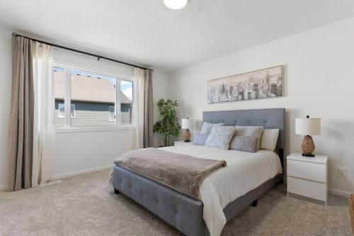 18 Southwinds Link Sw, Airdrie, AB - Indoor Photo Showing Bedroom