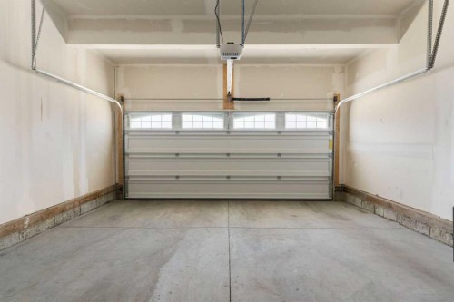 18 Southwinds Link Sw, Airdrie, AB - Indoor Photo Showing Garage
