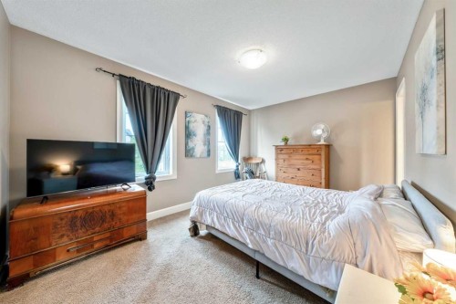 1333 Windstone Road Sw, Airdrie, AB - Indoor Photo Showing Bedroom
