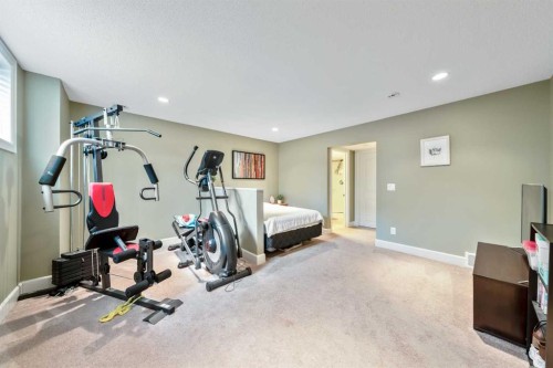 1333 Windstone Road Sw, Airdrie, AB - Indoor Photo Showing Gym Room