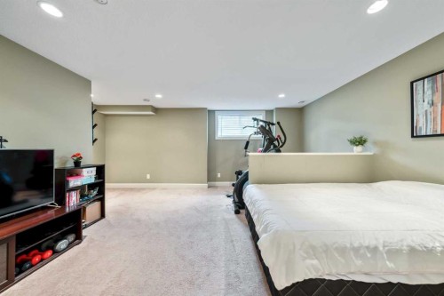 1333 Windstone Road Sw, Airdrie, AB - Indoor Photo Showing Bedroom