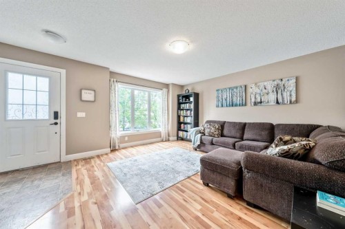 1333 Windstone Road Sw, Airdrie, AB - Indoor Photo Showing Living Room