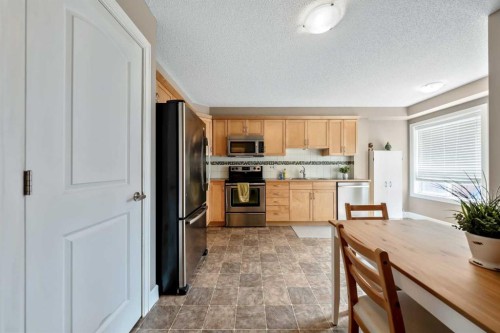 1333 Windstone Road Sw, Airdrie, AB - Indoor Photo Showing Kitchen