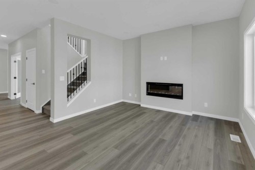 172 Starling Place Nw, Calgary, AB - Indoor Photo Showing Living Room With Fireplace