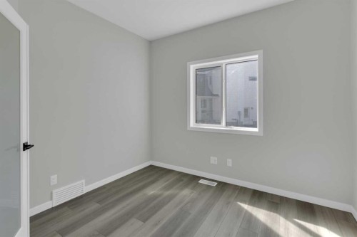 172 Starling Place Nw, Calgary, AB - Indoor Photo Showing Other Room