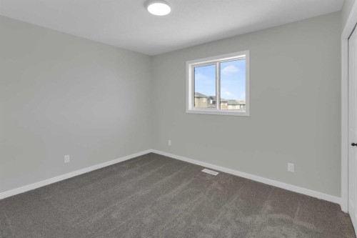 172 Starling Place Nw, Calgary, AB - Indoor Photo Showing Other Room