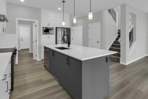 172 Starling Place Nw, Calgary, AB - Indoor Photo Showing Kitchen With Upgraded Kitchen