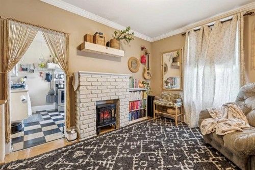 831 4A Street Ne, Calgary, AB - Indoor With Fireplace