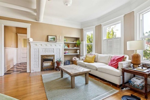 831 4A Street Ne, Calgary, AB - Indoor Photo Showing Living Room With Fireplace