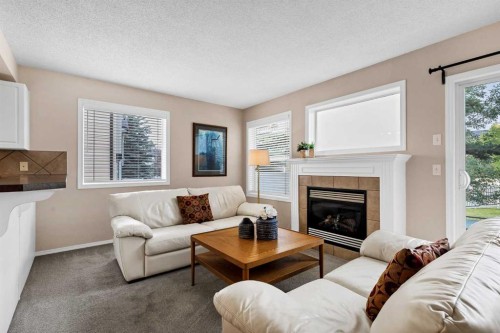 17 Country Village Circle Ne, Calgary, AB - Indoor Photo Showing Living Room With Fireplace