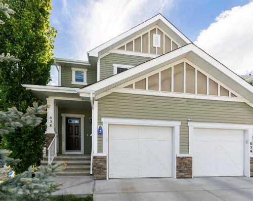 638 River Heights Crescent, Cochrane, AB - Outdoor With Facade