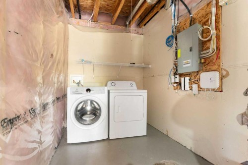 638 River Heights Crescent, Cochrane, AB - Indoor Photo Showing Laundry Room
