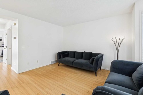 25 Coville Gardens Ne, Calgary, AB - Indoor Photo Showing Living Room