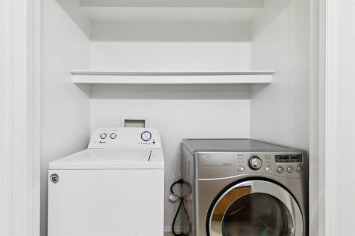 25 Coville Gardens Ne, Calgary, AB - Indoor Photo Showing Laundry Room