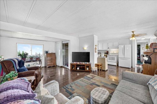 88 Big Hill Way Se, Airdrie, AB - Indoor Photo Showing Living Room