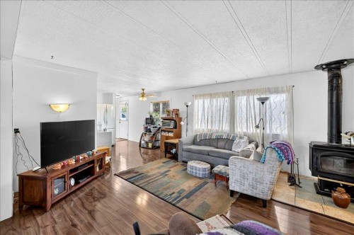 88 Big Hill Way Se, Airdrie, AB - Indoor Photo Showing Living Room