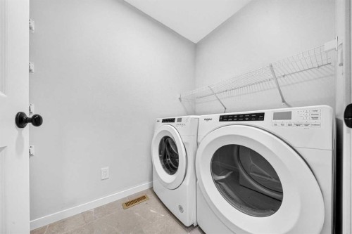 389 Cornerbrook Road Ne, Calgary, AB - Indoor Photo Showing Laundry Room