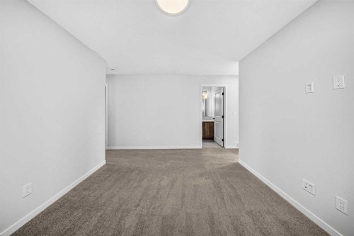 389 Cornerbrook Road Ne, Calgary, AB - Indoor Photo Showing Other Room