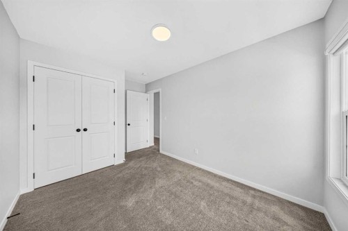 389 Cornerbrook Road Ne, Calgary, AB - Indoor Photo Showing Other Room