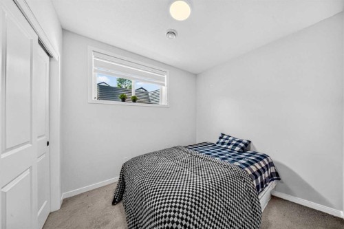 389 Cornerbrook Road Ne, Calgary, AB - Indoor Photo Showing Bedroom