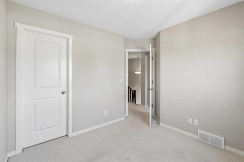 175 Panamount Way Nw, Calgary, AB - Indoor Photo Showing Other Room