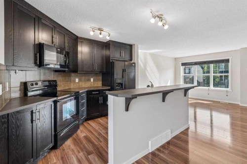 175 Panamount Way Nw, Calgary, AB - Indoor Photo Showing Kitchen With Upgraded Kitchen
