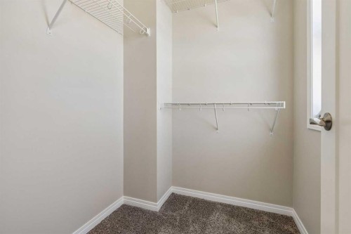 229 Fireside Drive, Cochrane, AB - Indoor With Storage