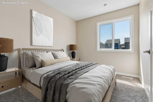 229 Fireside Drive, Cochrane, AB - Indoor Photo Showing Bedroom