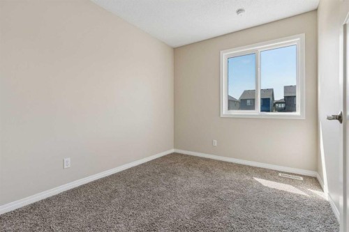 229 Fireside Drive, Cochrane, AB - Indoor Photo Showing Other Room