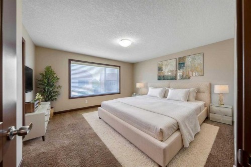 183 Cranford Green Se, Calgary, AB - Indoor Photo Showing Bedroom