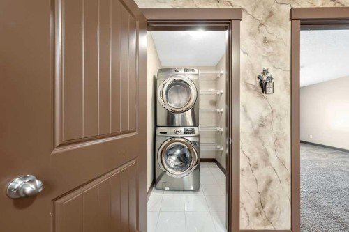 183 Cranford Green Se, Calgary, AB - Indoor Photo Showing Laundry Room