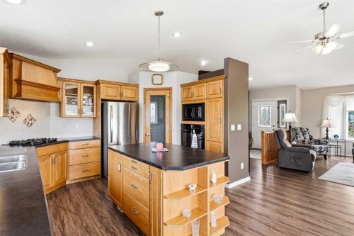 34055 Range Road 24, Rural Mountain View County, AB - Indoor Photo Showing Kitchen With Double Sink
