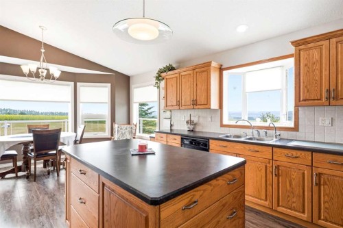 34055 Range Road 24, Rural Mountain View County, AB - Indoor Photo Showing Kitchen With Double Sink