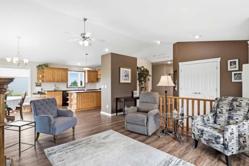 34055 Range Road 24, Rural Mountain View County, AB - Indoor Photo Showing Living Room With Fireplace